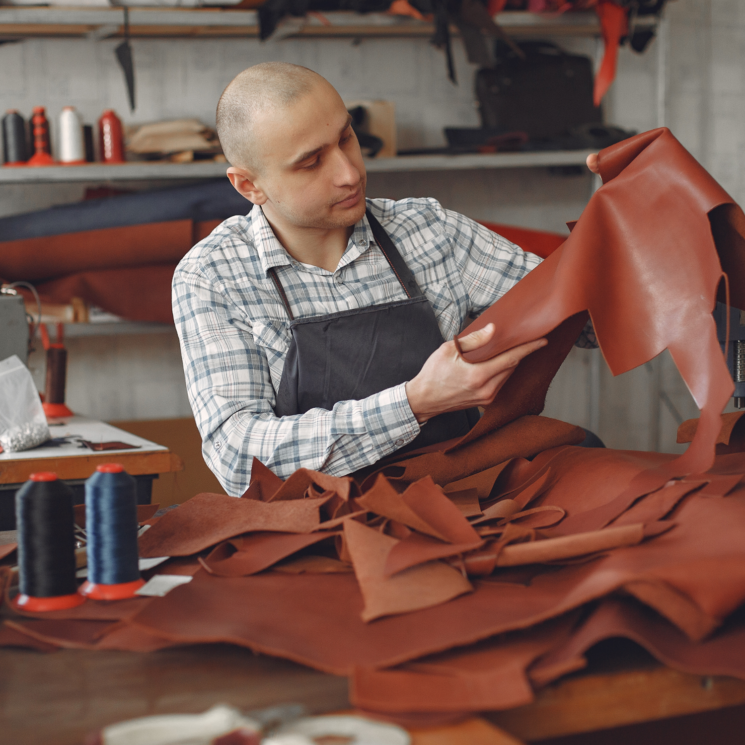 Services | Terranore Terranore artisan inspecting eco-friendly raw materials to craft sustainable and scalable solutions for D2C brands.