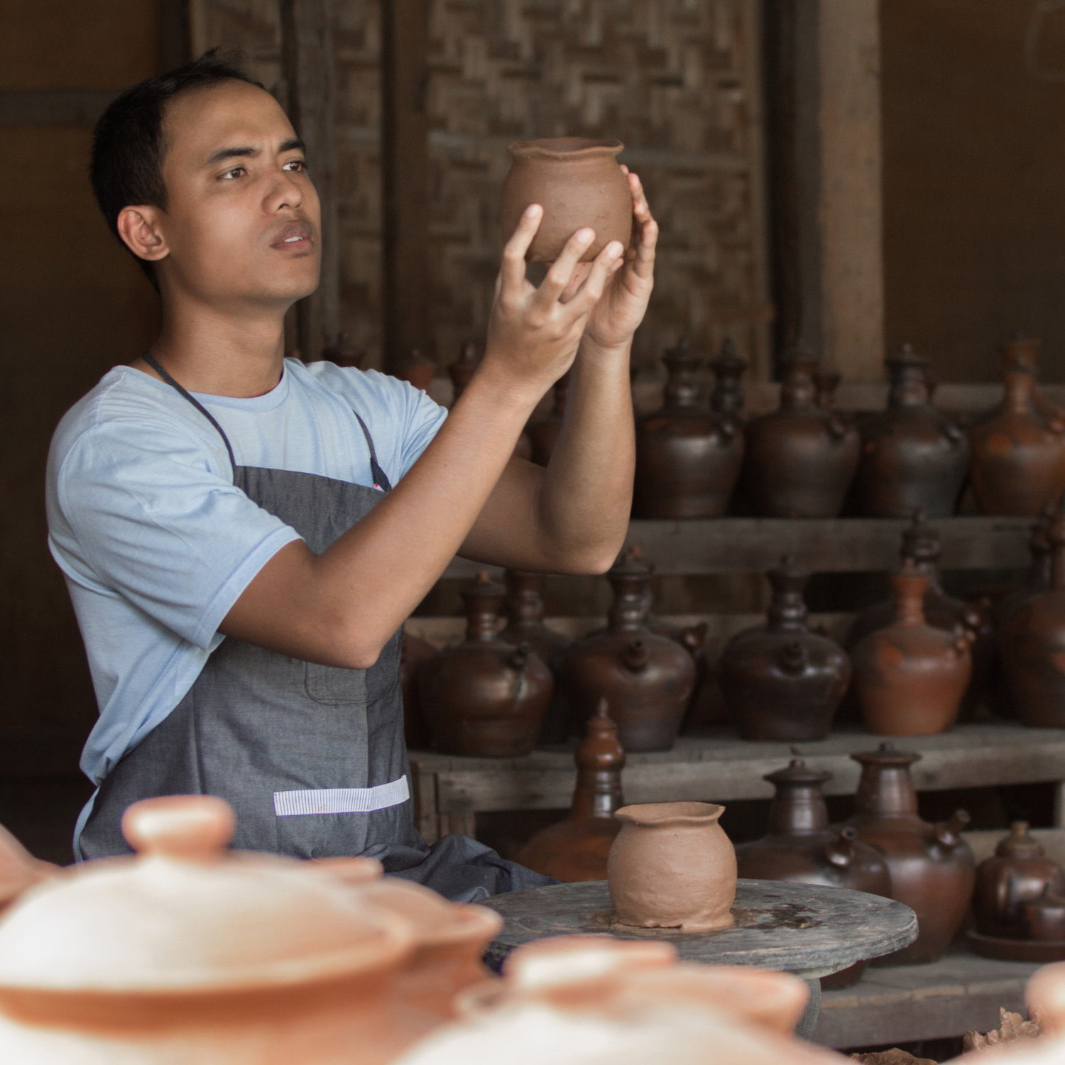 Services | Terranore Terranore artisan shaping pottery to highlight sustainable craftsmanship and scalable product development for D2C brands